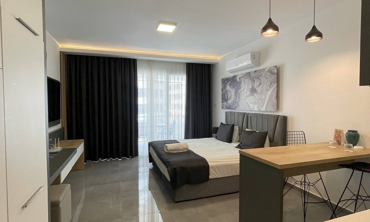 Trikomo Apartment | Charming studio with pool, sauna, gym, airco, TV, kitchen & stylish designs