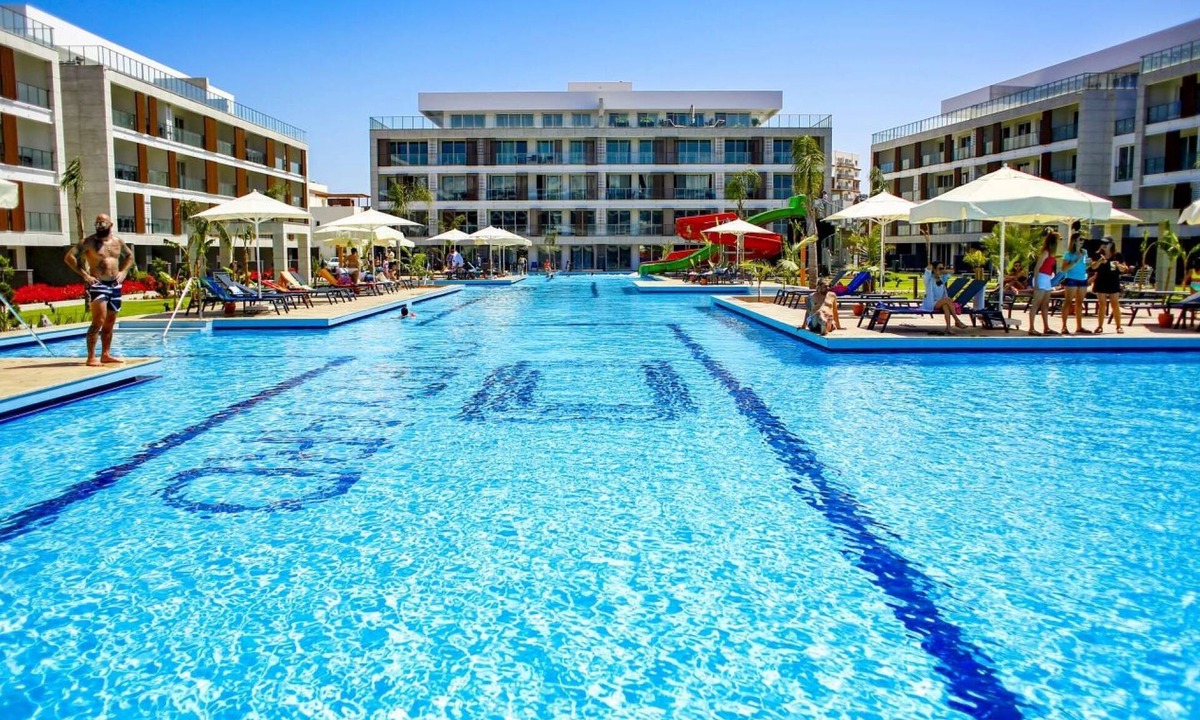 Trikomo Apartment | Comfortable Flat Close to the Beach with Shared Pool and Balcony in Iskele, Cyprus