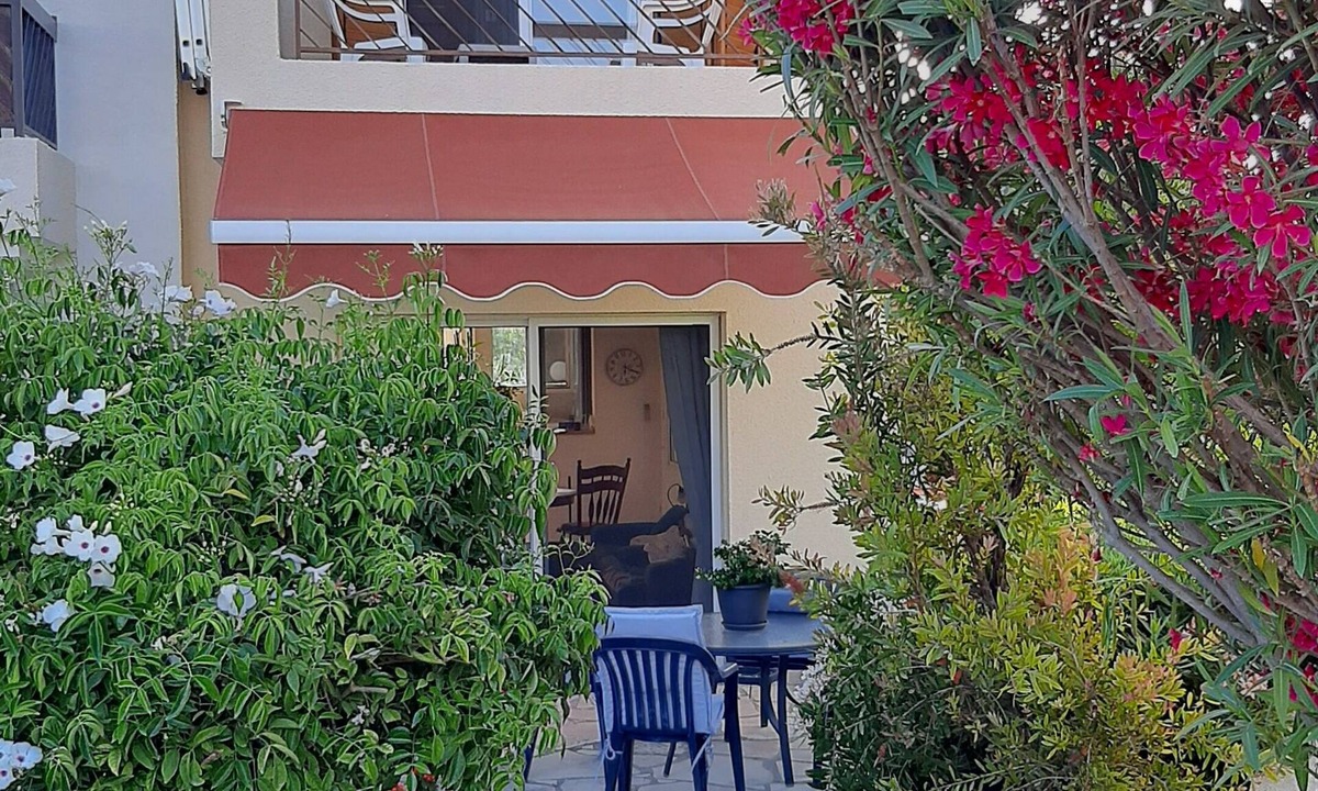 Peyia Town House | Eva Gardens corner house with garden, pool, UK TV, Netflix, next to CORAL BAY