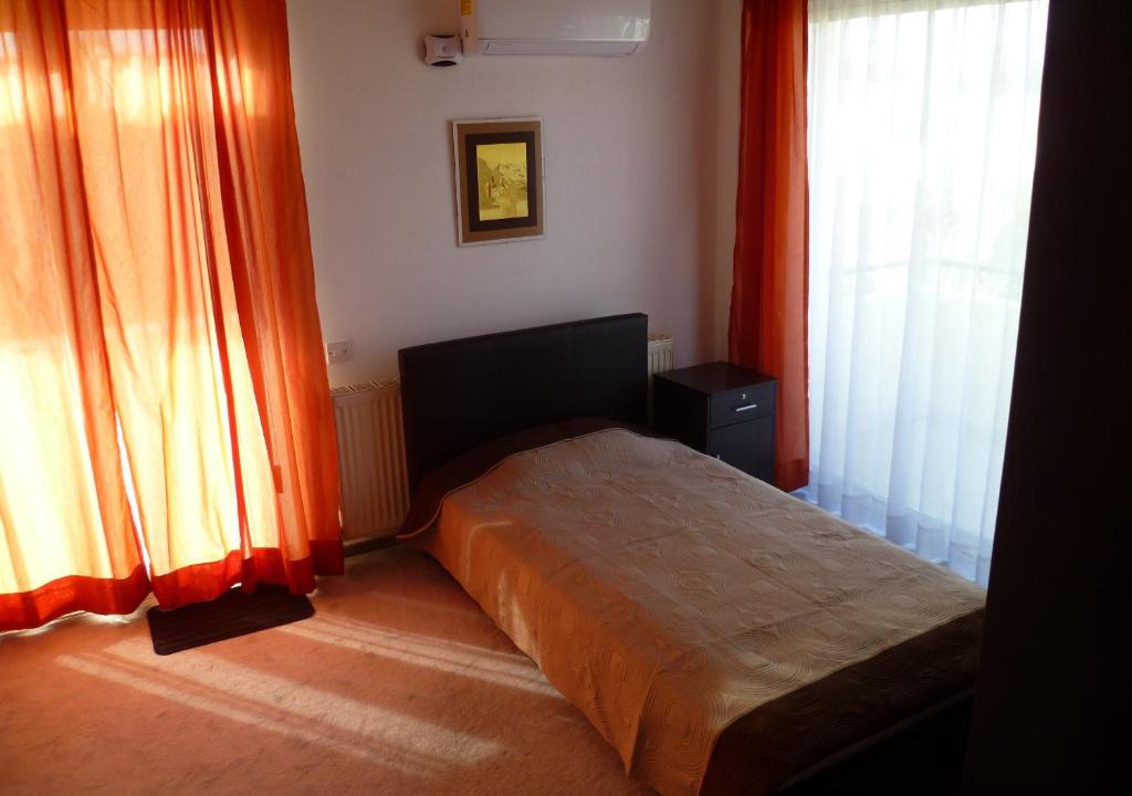 Nicosia House | Private deluxe room with balcony at Datacom building