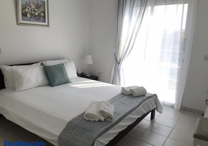 Modern pool facing apartment in popular Limnaria Gardens in Paphos