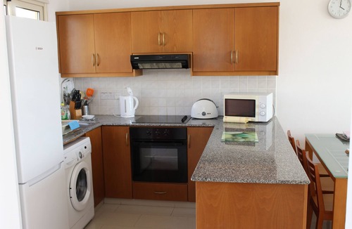 Peyia Town Apartment | 2 bedroom Penthouse apartment, stunning views, Aircon, 2 pools, Free WIFI