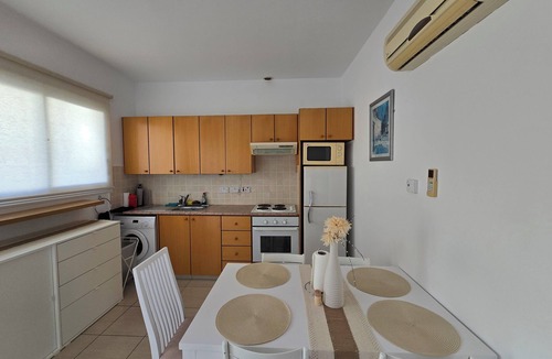 Peyia Town House | 2-bedroom townhome in peaceful Pegeia with big communal pool.