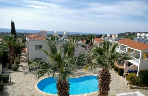 Peyia Town Apartment | A beautiful 2 bedroom apartment with sea views and hot tub .