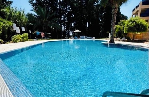 Universal Apartment | A spacious apartment with one bedroom and a living room.
