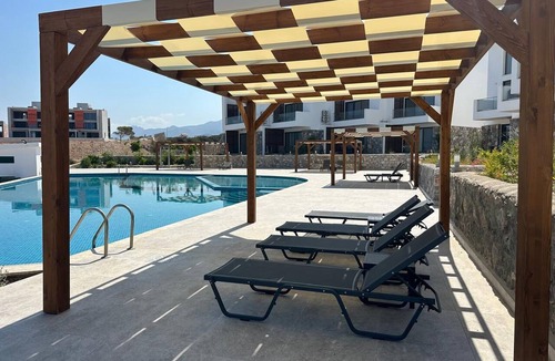 Kucukerenkoy Apartment | "Azure Pearl" - Wake Up by the Sea · Oceanfront Garden Retreat with Pool