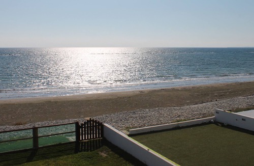 Pervolia House | Cozy Beachfront Villa with free wifi and parking ideal for family vacationers.