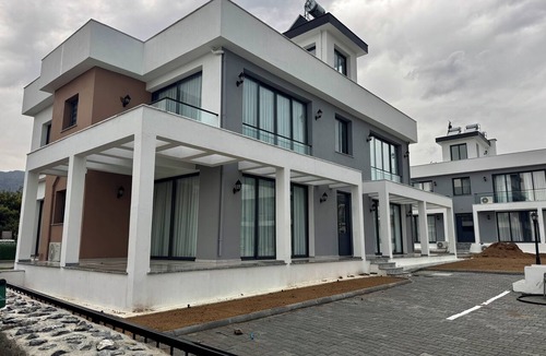 Karavas Apartment | Luxury apartments next to Merit hotels with swimming pool, terrace and garden