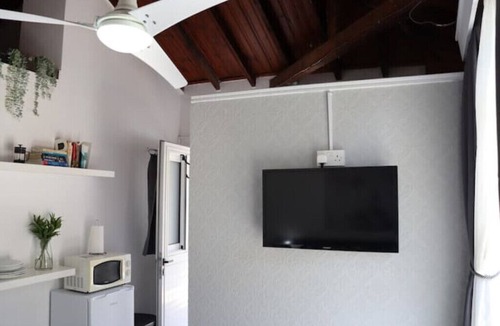 Kiti Apartment | Mediterranean Poolside Garden Cottage