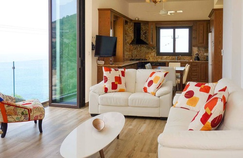 Pachyammos House | This attractive stone villa is set in an elevated position and commands wonderful views across the c