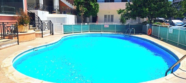 2 Bed Top Floor Apartment with Lift and Swimming Pool on quiet Complex in Geroskipou