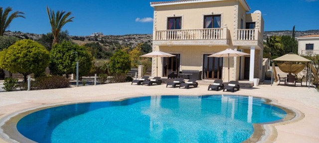 3 bedroom villa with a large swimming pool and great sea views! in Peyia