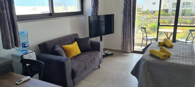 Beachfront Penthouse Studio Apartment, Eco Wellness Resort, Heated Pool in Bahçeli