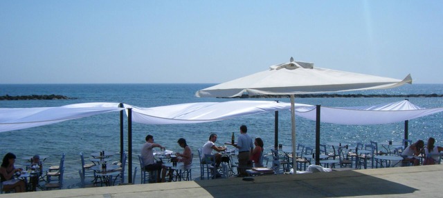 Breakfast on the terrace next to the gorgeous pool, walkable to sandy beaches in Kato Paphos