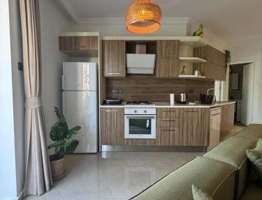 Kıbrıs Girnede 1 yatak odalı Süper lüks havuzlu daire in Kalokhorio