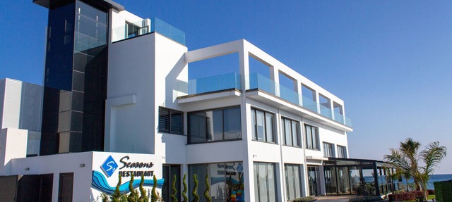LUXURY 2-BEDROOM APARTMENTS IN SEAFRONT COMPLEX WITH PRIVATE BEACH in Trikomo