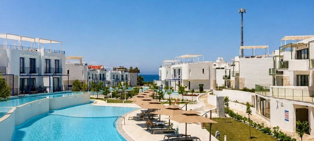 Modern rooftop apartment with ocean views and a pool in Lapta