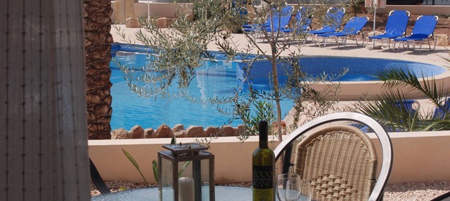 Peaceful ground floor poolside apartment in Anarita near Paphos in Paphos