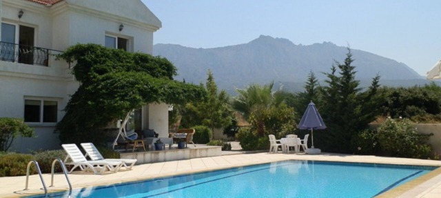 Villa Manolya with superb mountain & sea views +pool & gardens in premium area in Karaoglanoglu