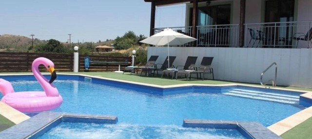 Yiannos House Pool and Spa (near the train station museum) in Evrychou