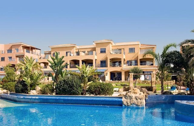 Modern pool facing apartment in popular Limnaria Gardens in Paphos