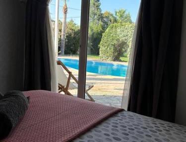 Mediterranean poolside garden cottage in Kiti
